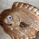 Decorative ceramic plate in the shape of a fish from the 1970s.