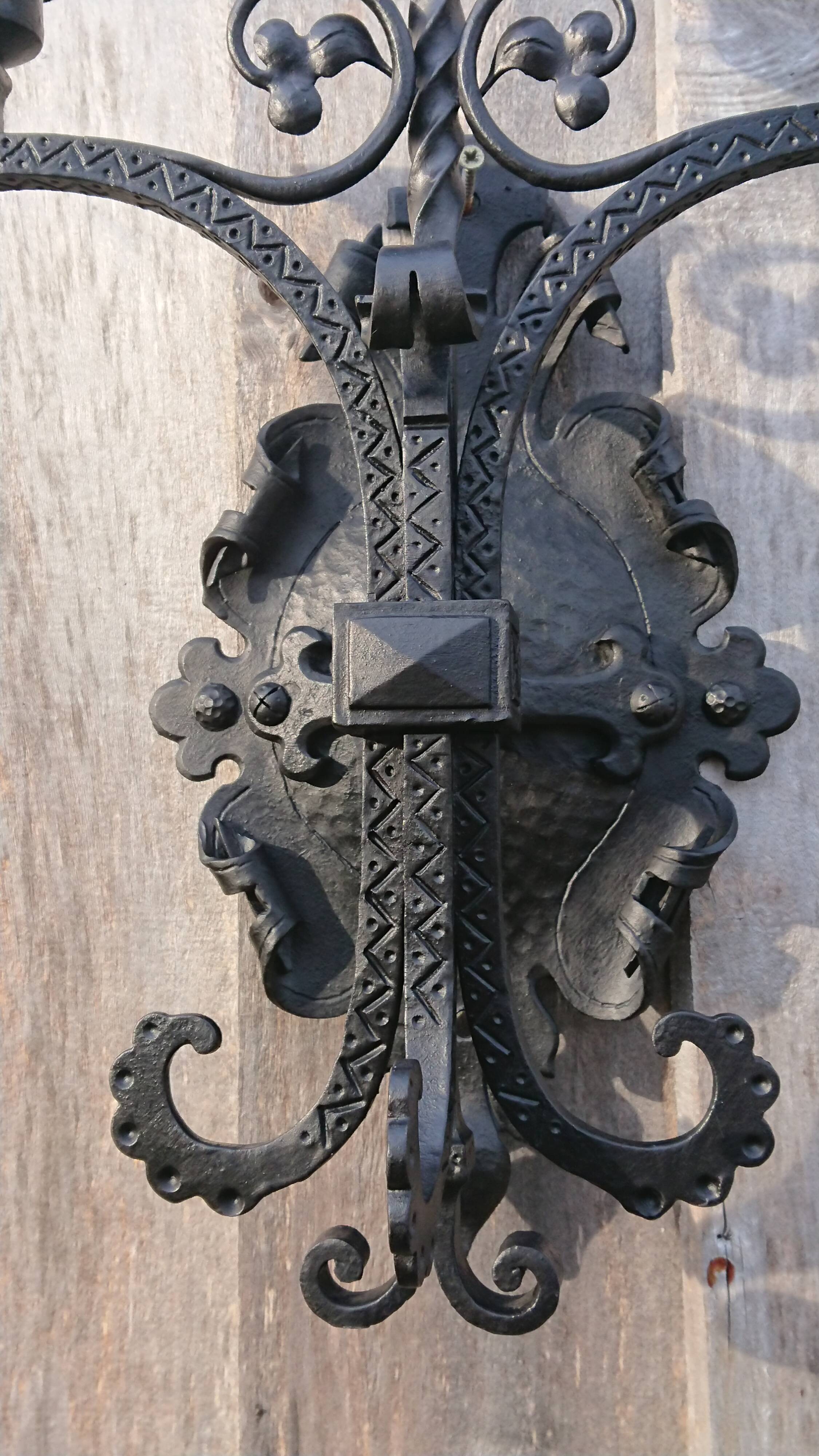 Pair of black wrought iron sconces - neo-Gothic style - from the 1950s