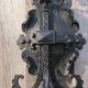 Pair of black wrought iron wall sconces - neo-Gothic style - from the 1950s