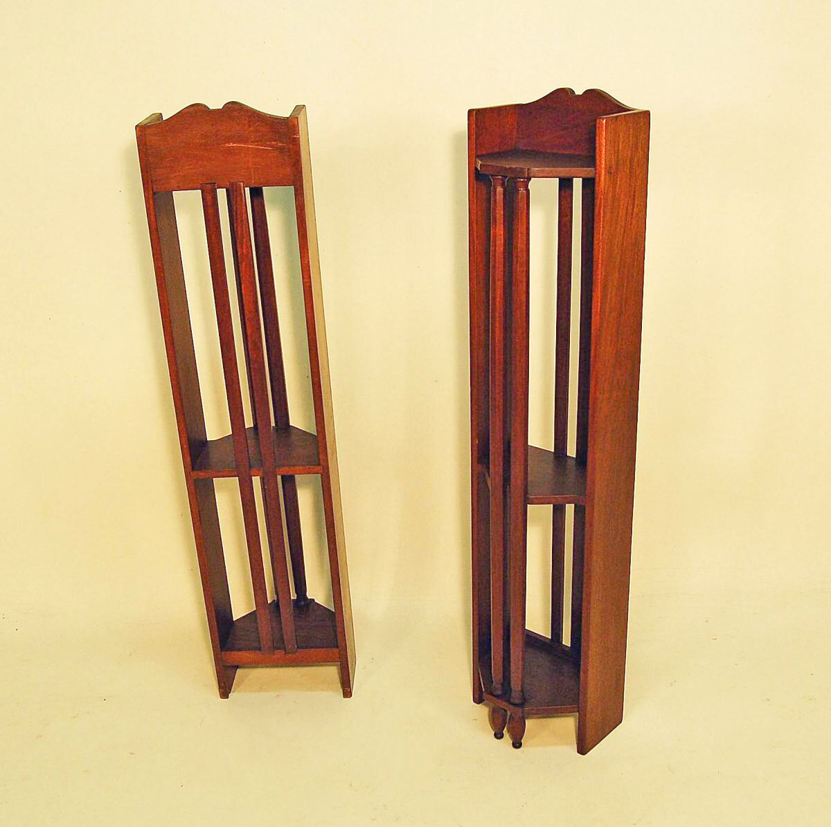 Pair of art deco mahogany wall columns