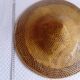 braided Asian hat. palm, bamboo, straw, wicker