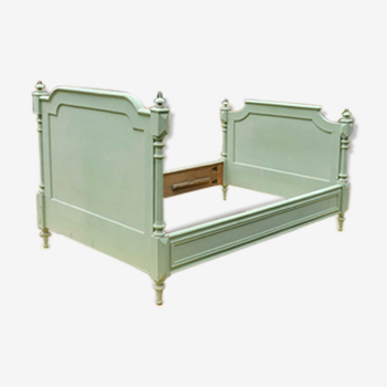 Bed frame in green painted wood