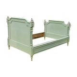 Bed frame in green painted wood