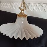 Round pendant light in pleated semi-opaque glass