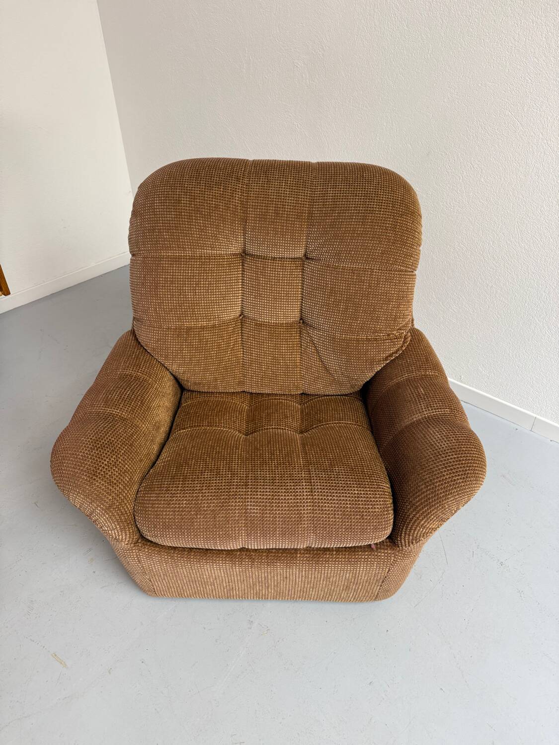 Old vintage 60s fabric lounge chair