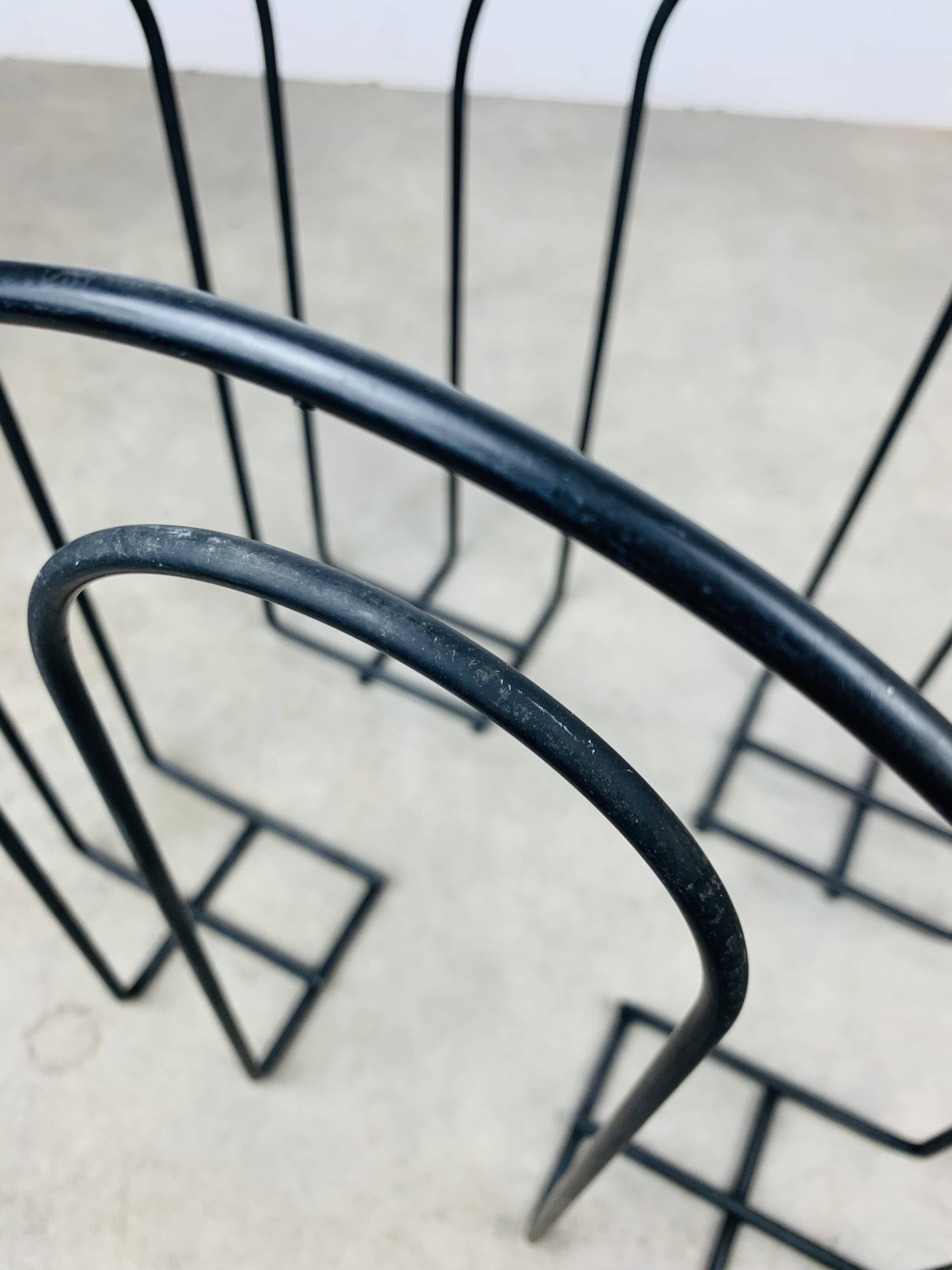 Postmodern metal magazine rack, black, 1980s.