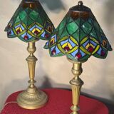 Pair of art nouveau bronze lamps, Tiffany-style glass lampshades