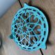 Under the flat mint blue cast