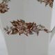 Lot teapot and sugar flowers in ancient ceramic