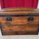 Curved wooden transport trunk from the late 19th to early 20th century.
