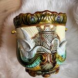 Majolica pot with signs