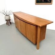 Curved enfilade Maison Regain in solid elm, 1970.