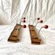 Pair of vintage wooden wall coat racks with three red ball hooks