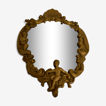 Gilded bronze mirror with angels and scrolls