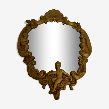 Miroir en bronze doré avec anges et volutes