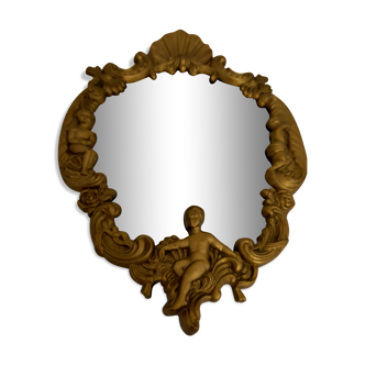 Gilded bronze mirror with angels and scrolls