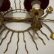 Applique soleil feuillage dorée années 60