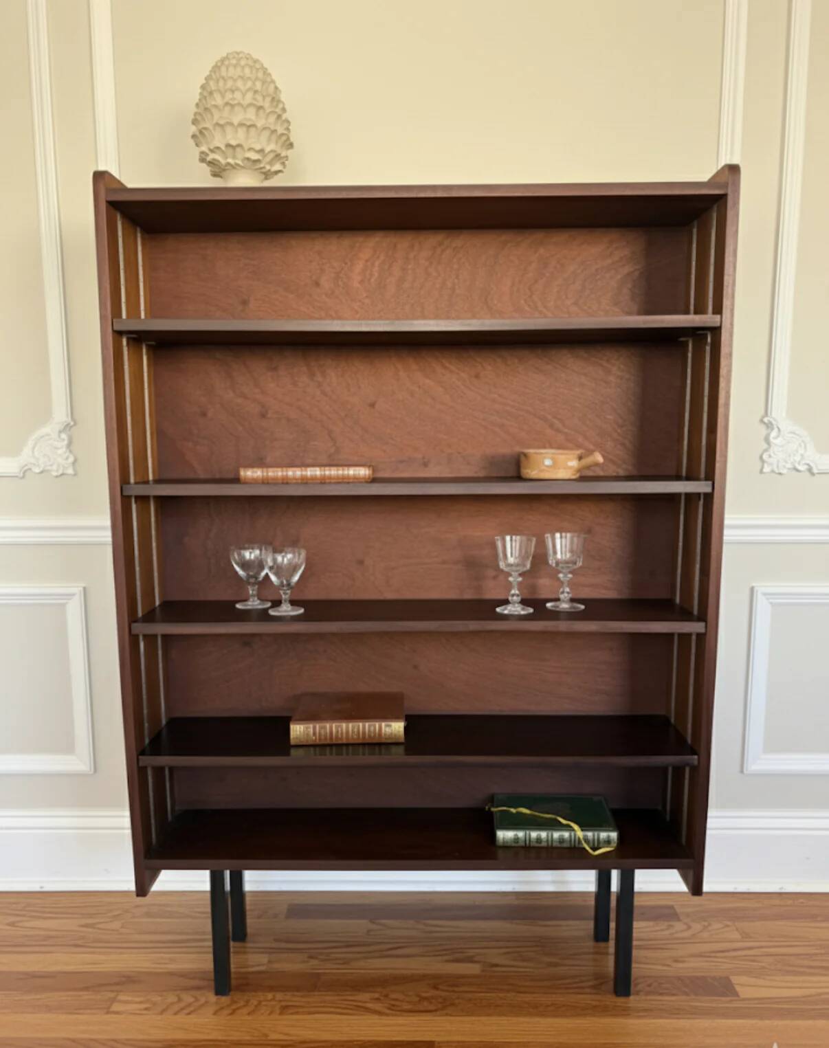 Vintage veneer bookcase with metal legs
