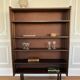 Vintage veneer bookcase with metal legs