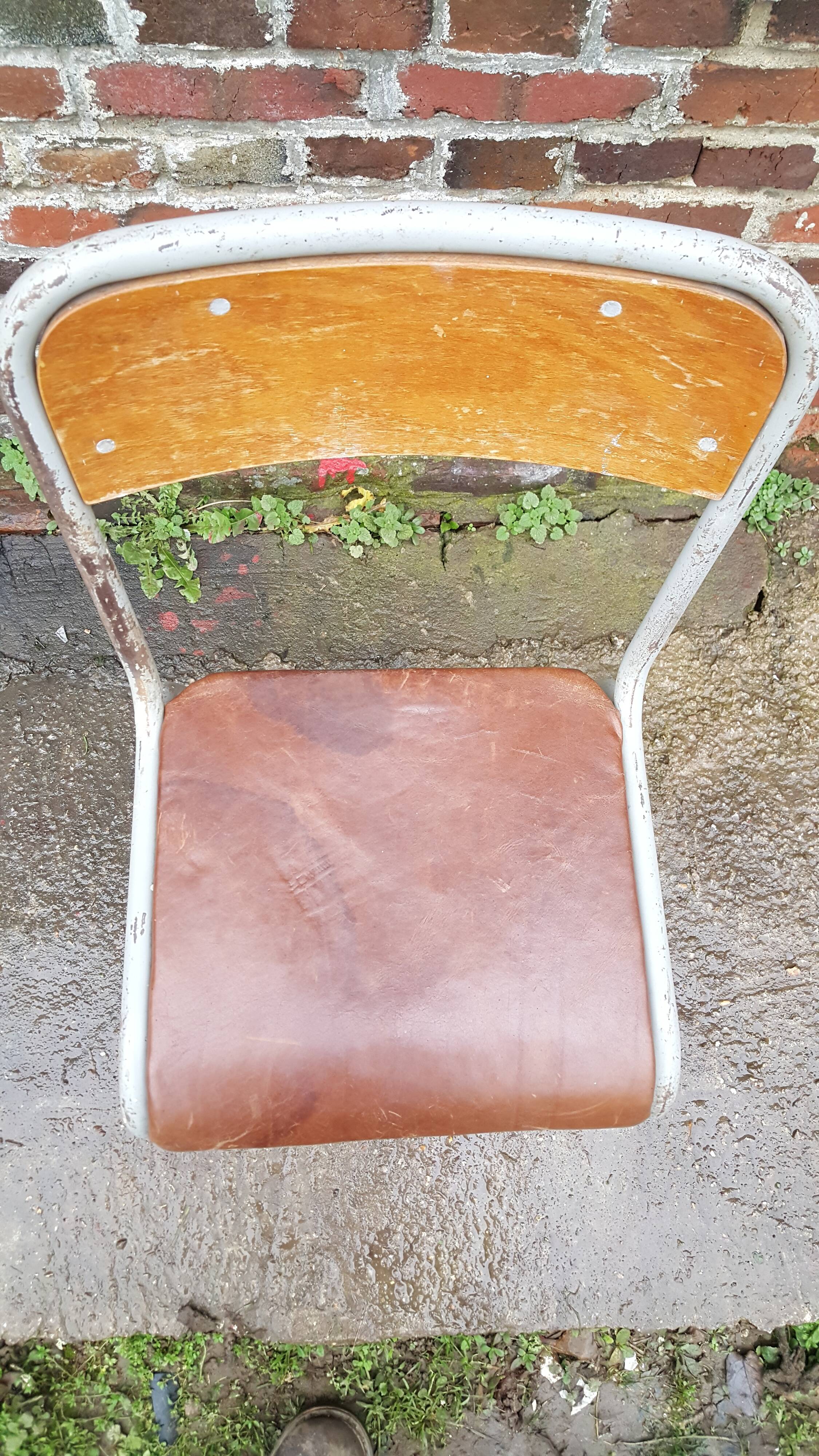Vintage chair dated 1955 leather seat