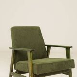 Scandinavian armchair deep olive green 1970s Boho style