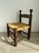 Chaise basse, de cheminée vintage style Charles Dudouyt en bois et paille