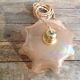 Suspension opaline rose