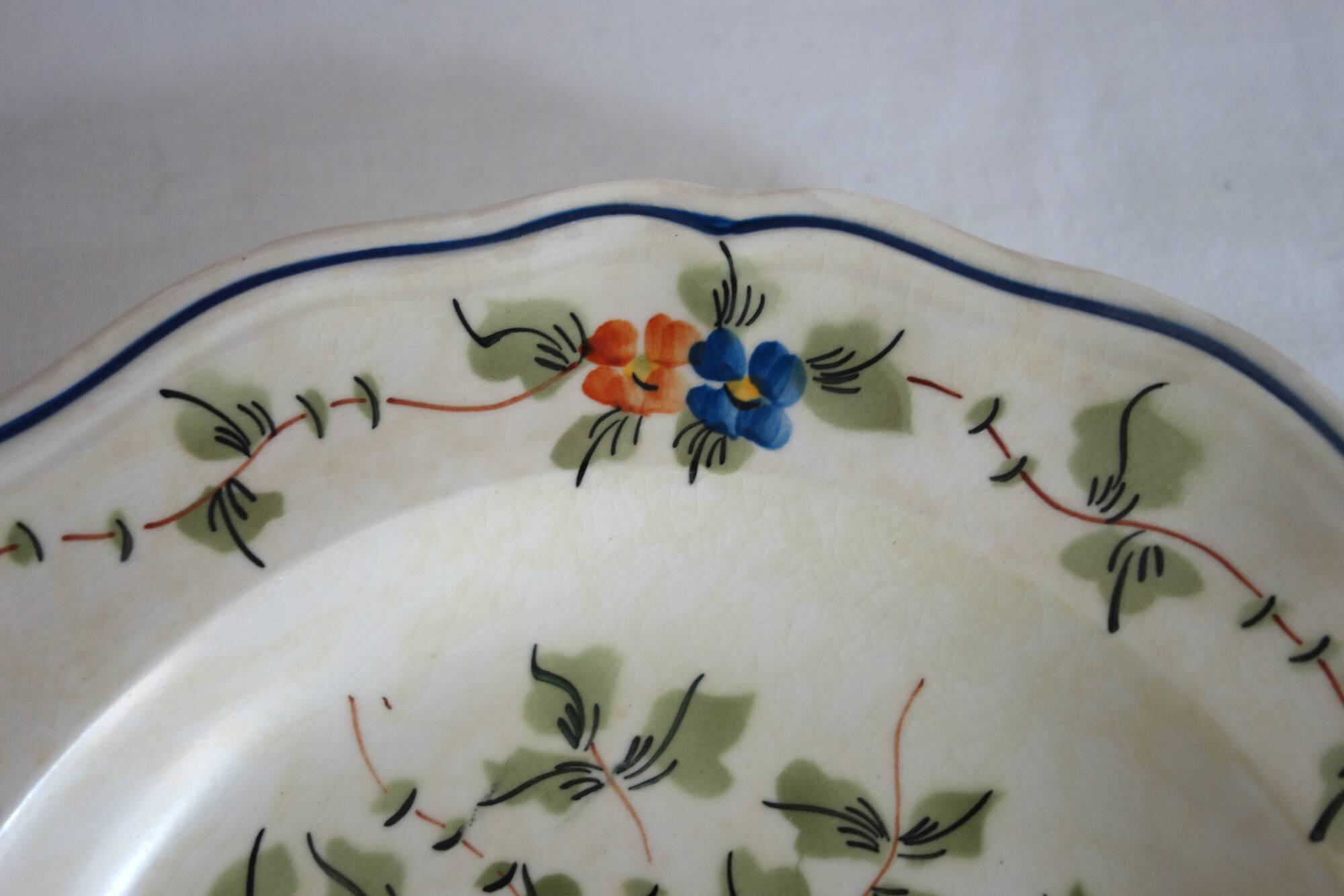 12 old Longchamp hollow plates with floral decoration