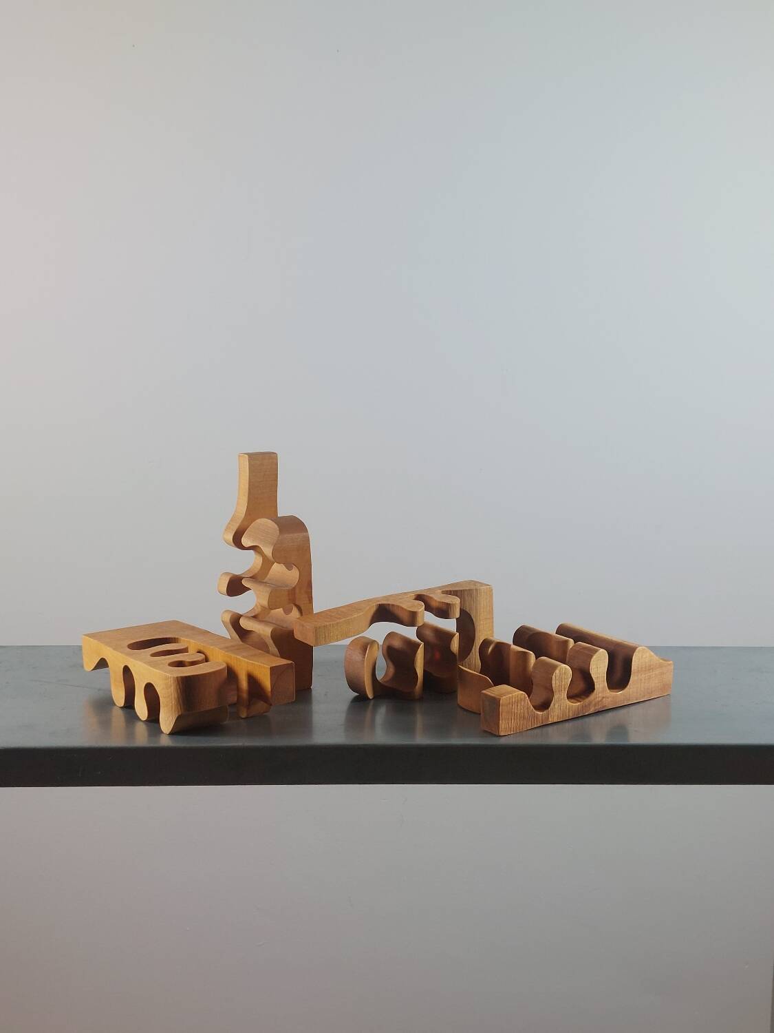 Vintage postmodern wooden puzzle sculpture by Gunnar Kanevad