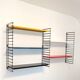Tomado wall unit with metal shelves by Dekker – Tomado