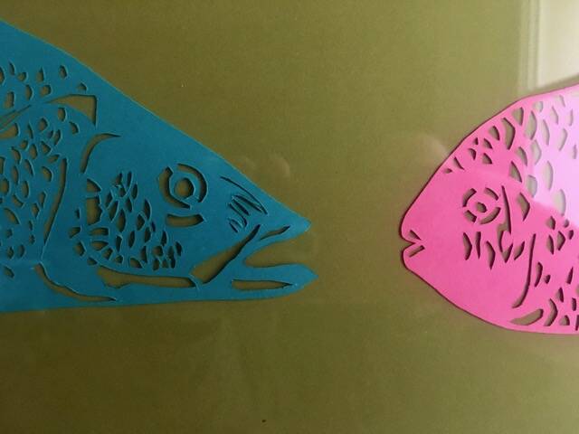 Colour paper artwork face to face