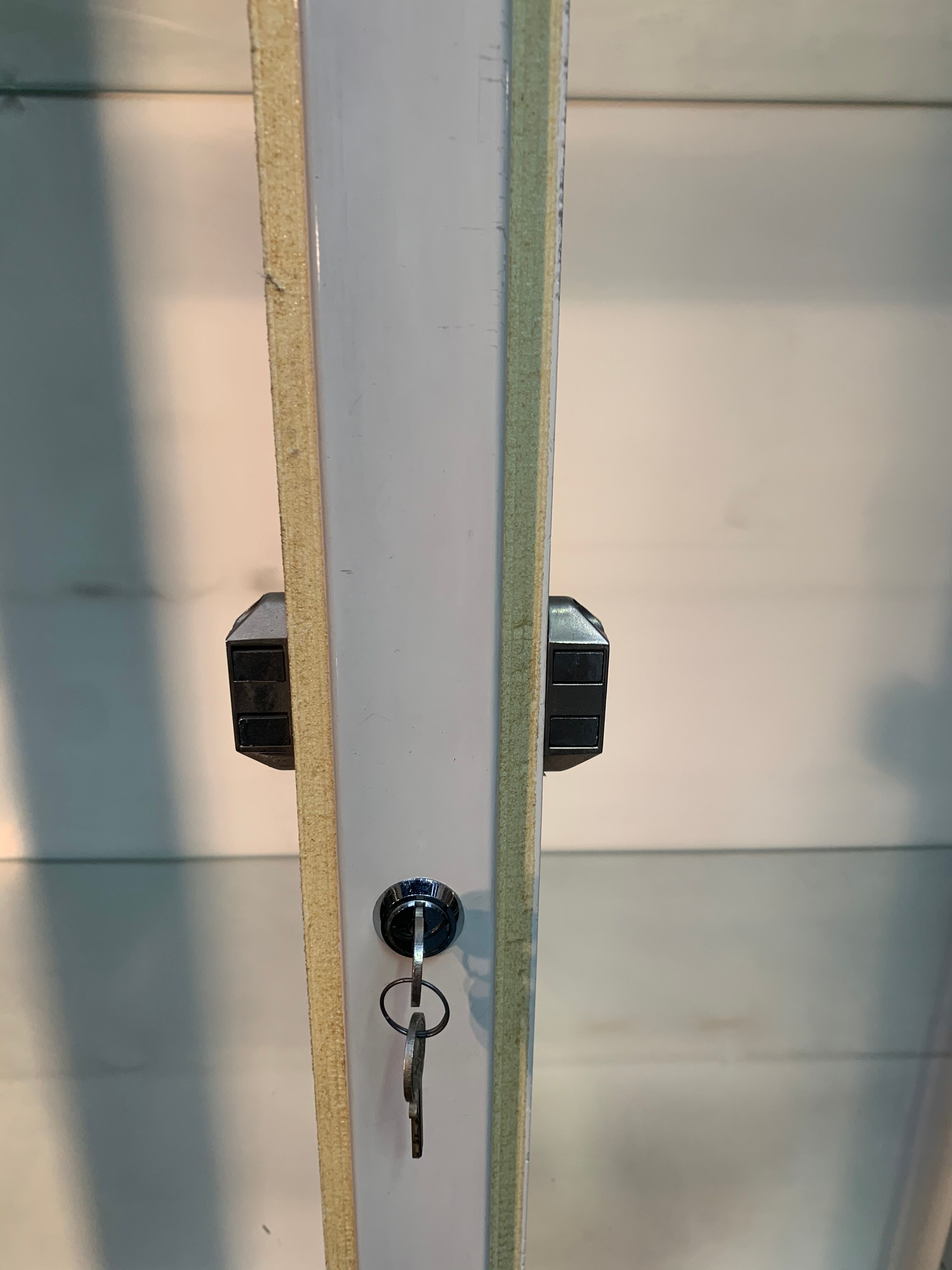 White enamelled metal design showcase. Period 1960