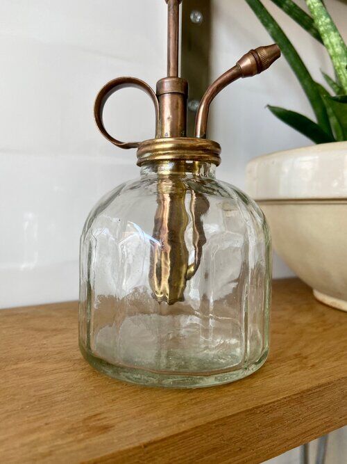 Glass and gold metal spray