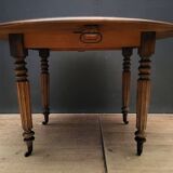 Round table with folding shutters on casters in solid wood year 1973