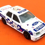 Miniature car Ford Sierra Sasol Burago Scale: 1/43rd Made in Italy