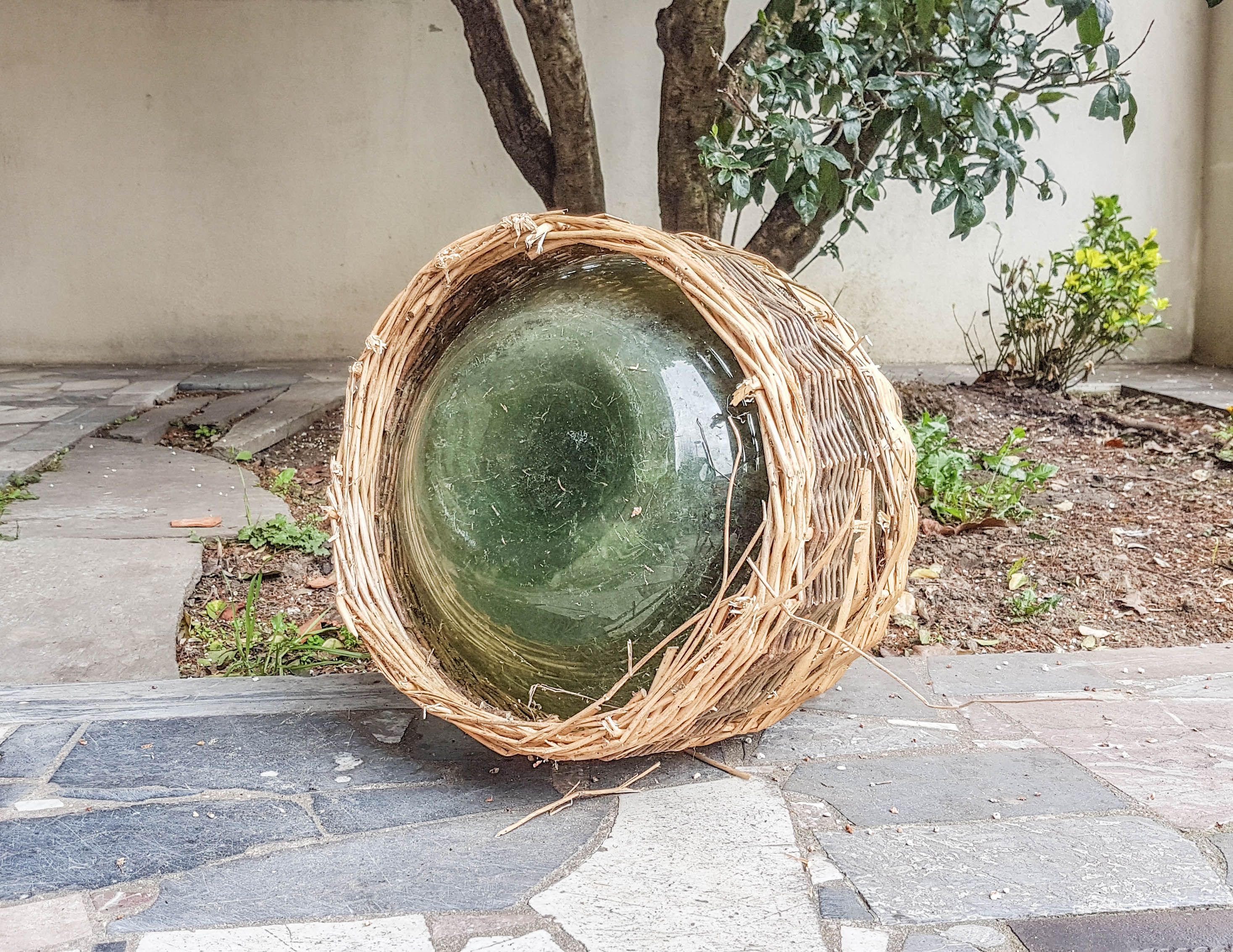 Demijohn covered with wicker