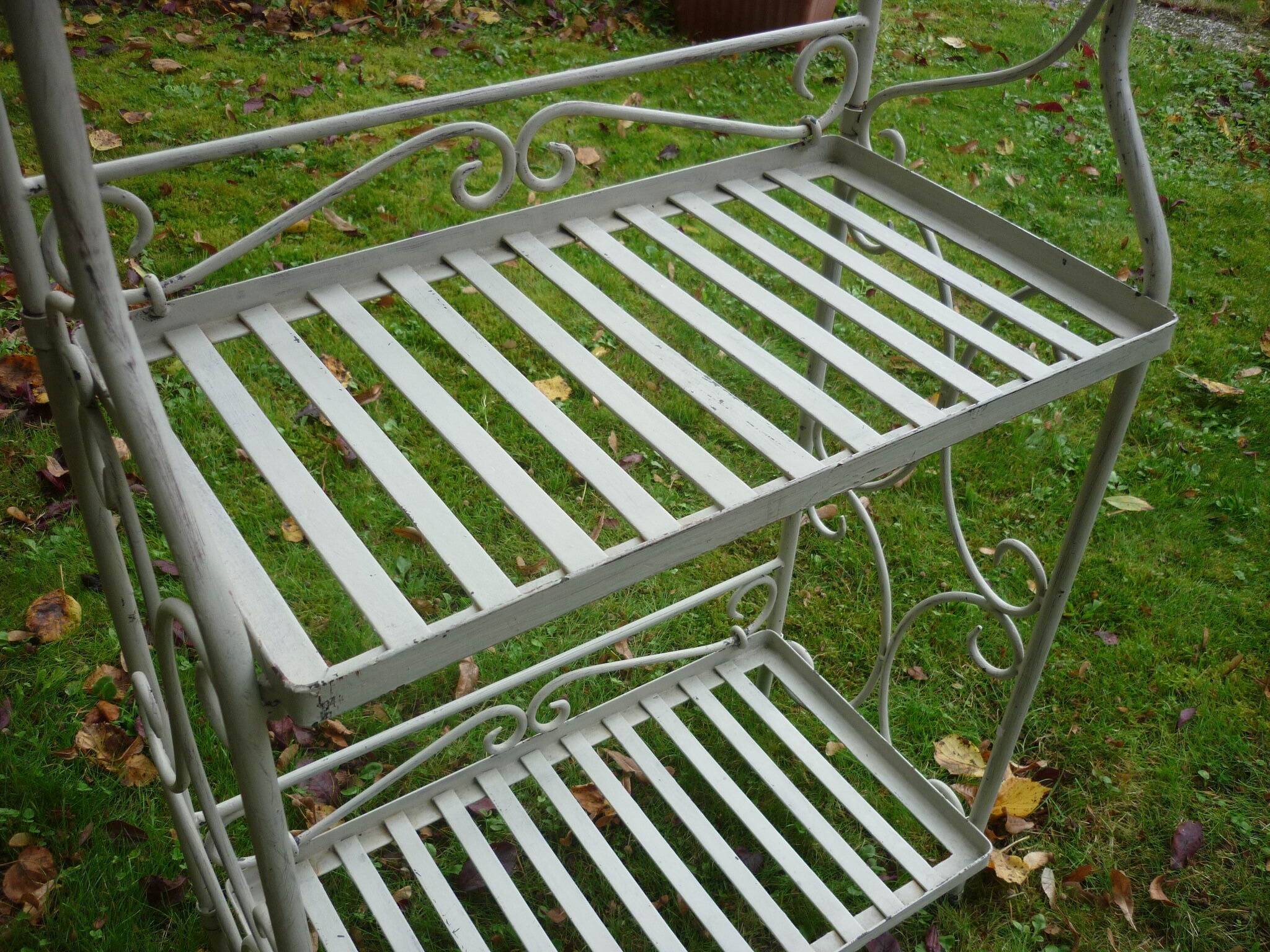 White wrought iron folding shelf