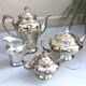 Tea and coffee service in porcelain and silvered enamel.