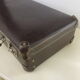 Old brown cardboard suitcase imitating the croco 50s/60s