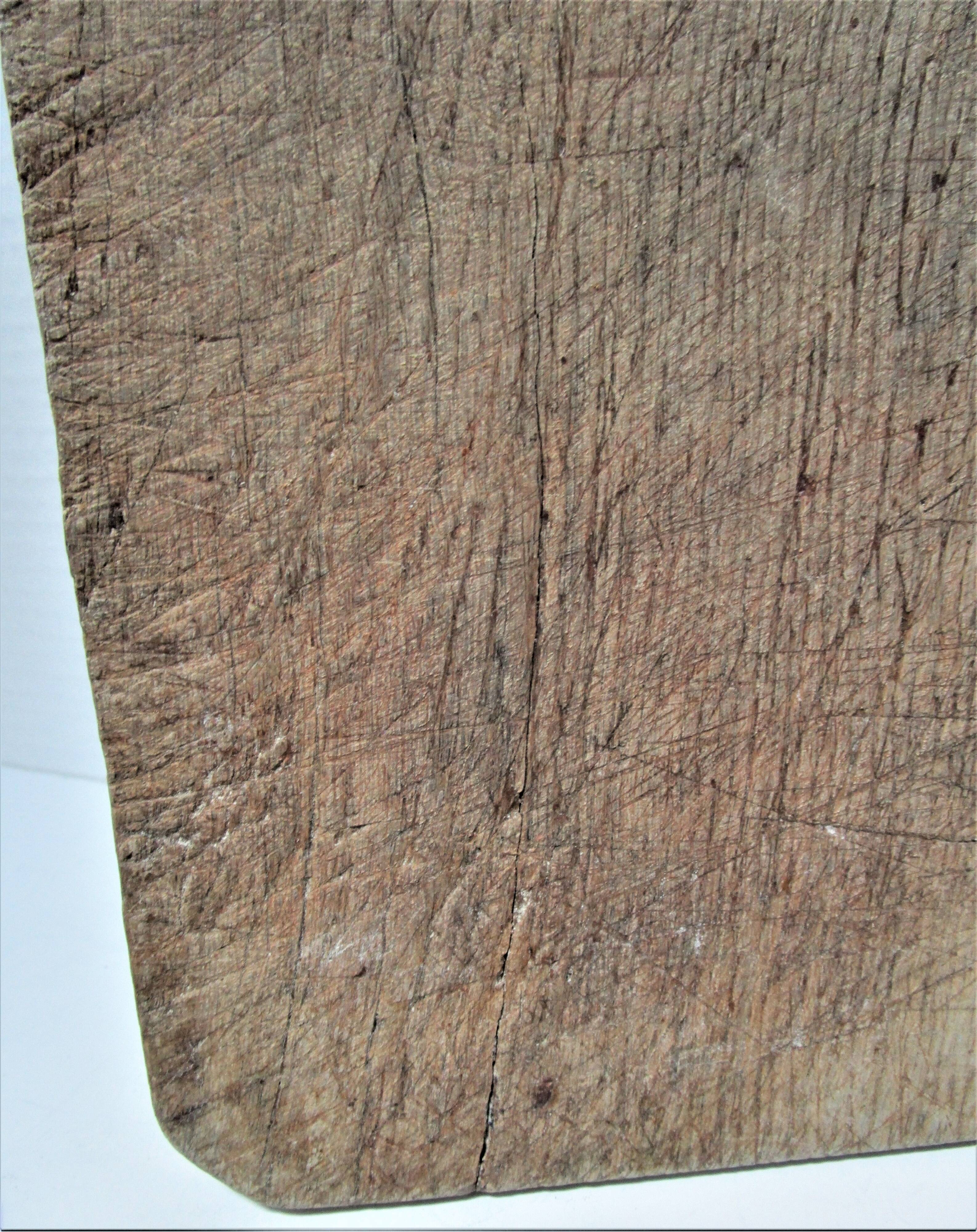 three vintage patinated solid wood cutting boards