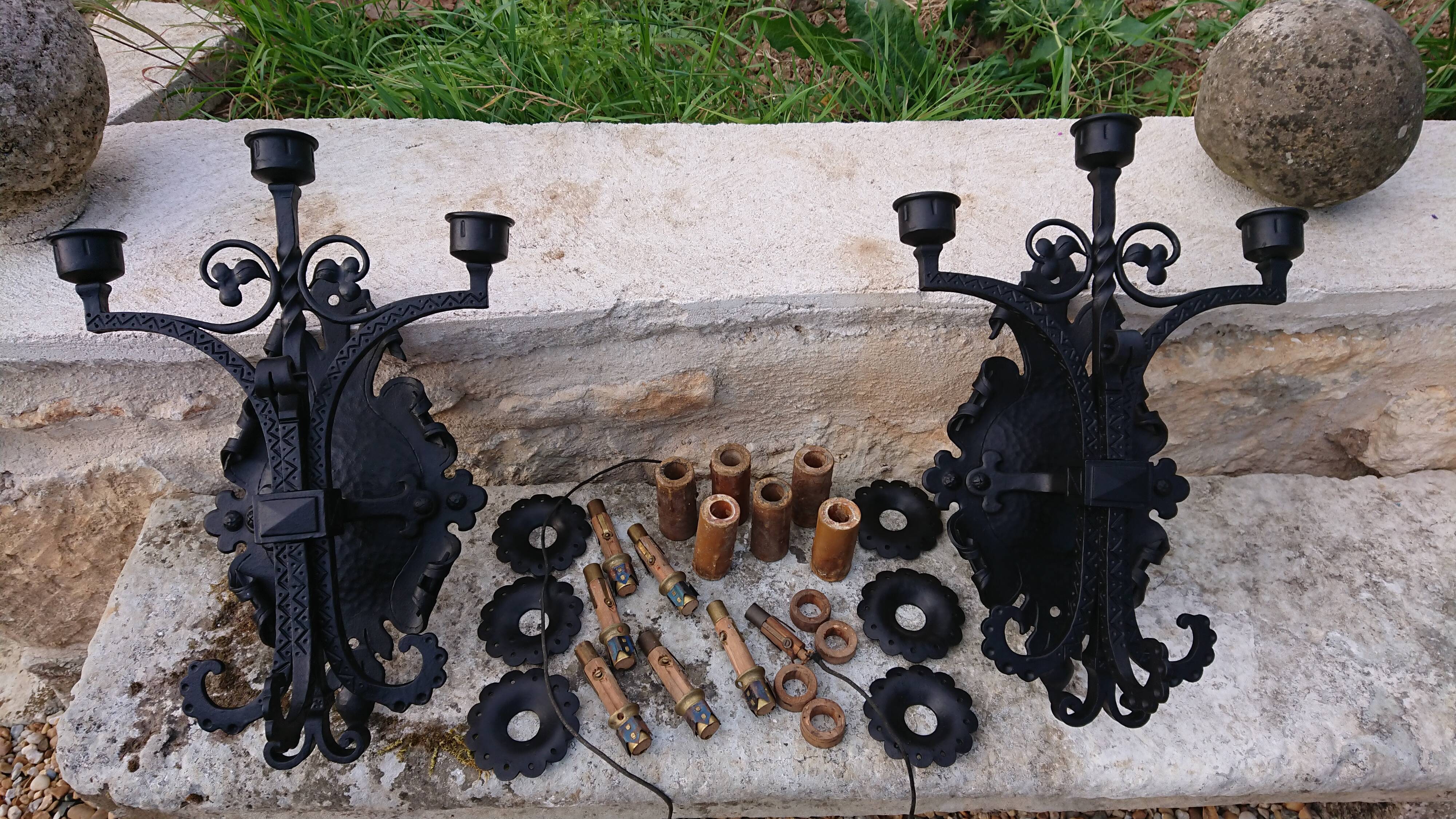 Pair of black wrought iron sconces - neo-Gothic style - from the 1950s