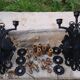 Pair of black wrought iron wall sconces - neo-Gothic style - from the 1950s