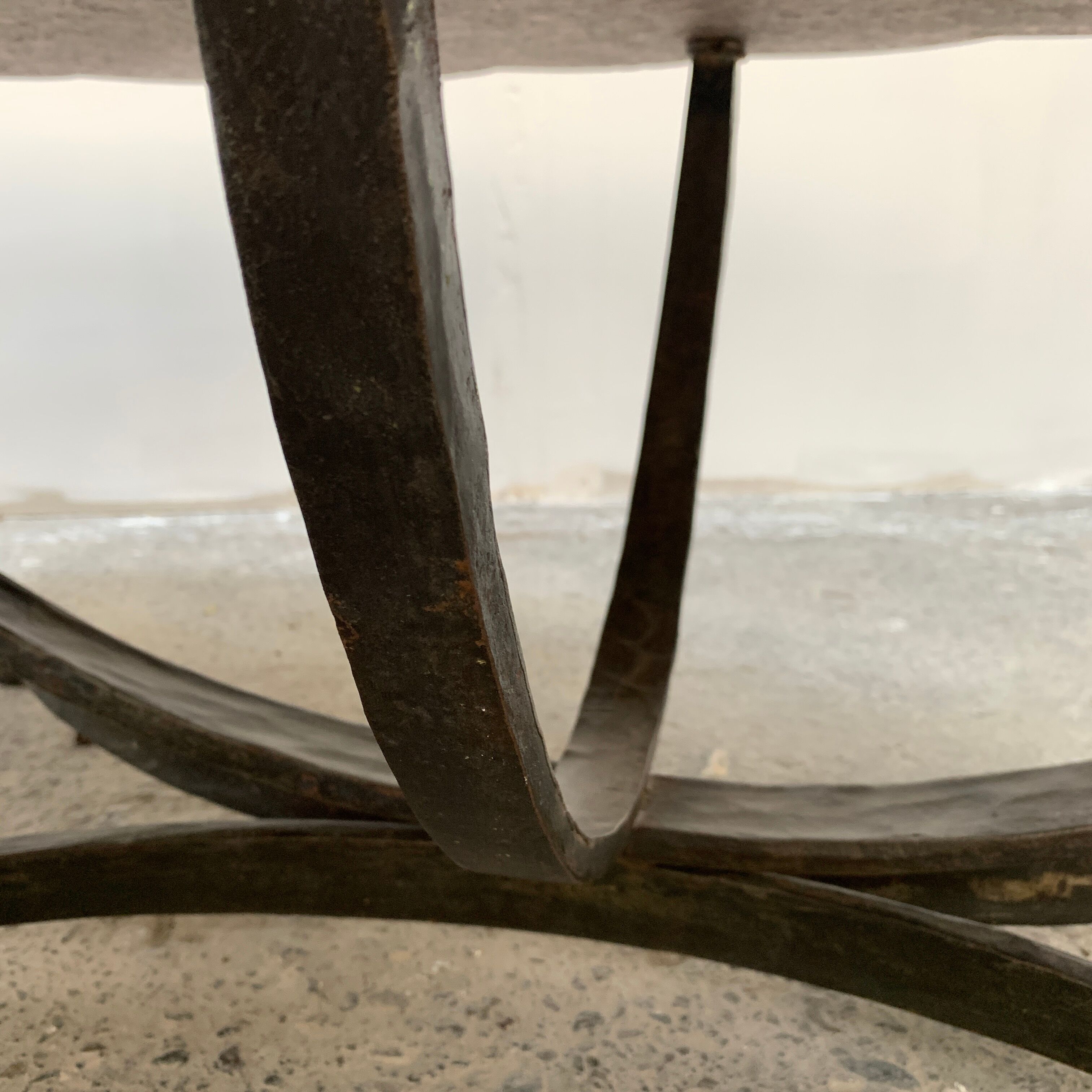 Granite and hammered wrought iron coffee table