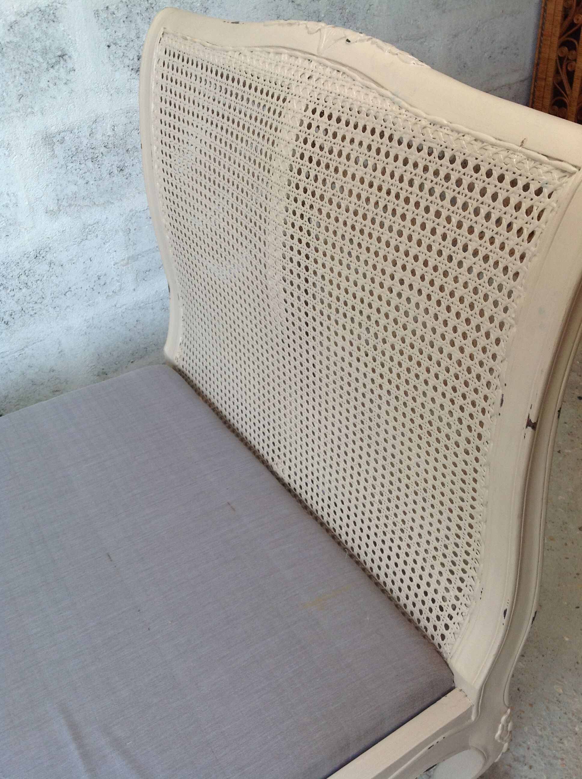 Carved wooden bench and caning bed