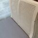 Lit banquette en bois sculpté et cannage