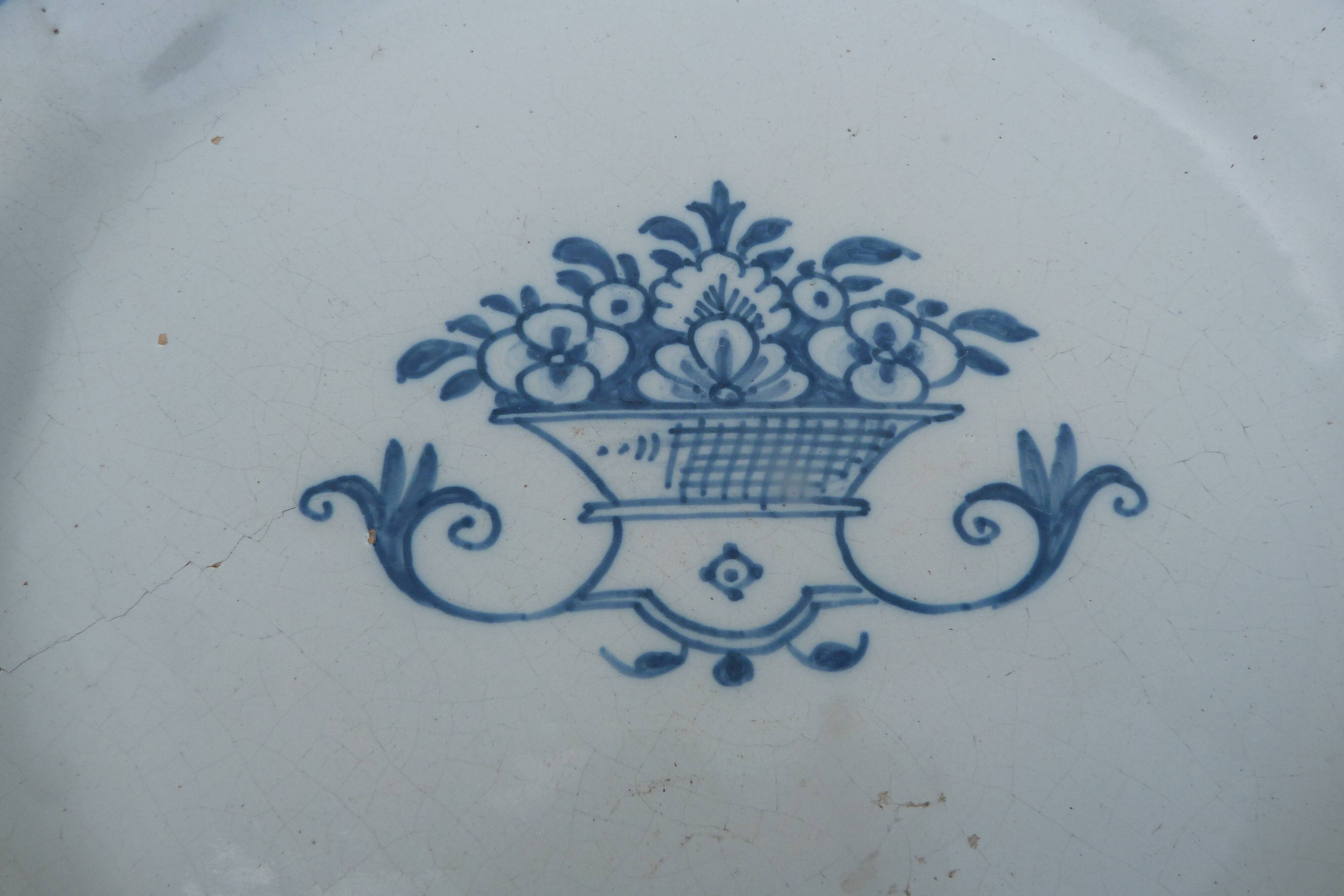 Large octagonal antique plate in Rouen faience.