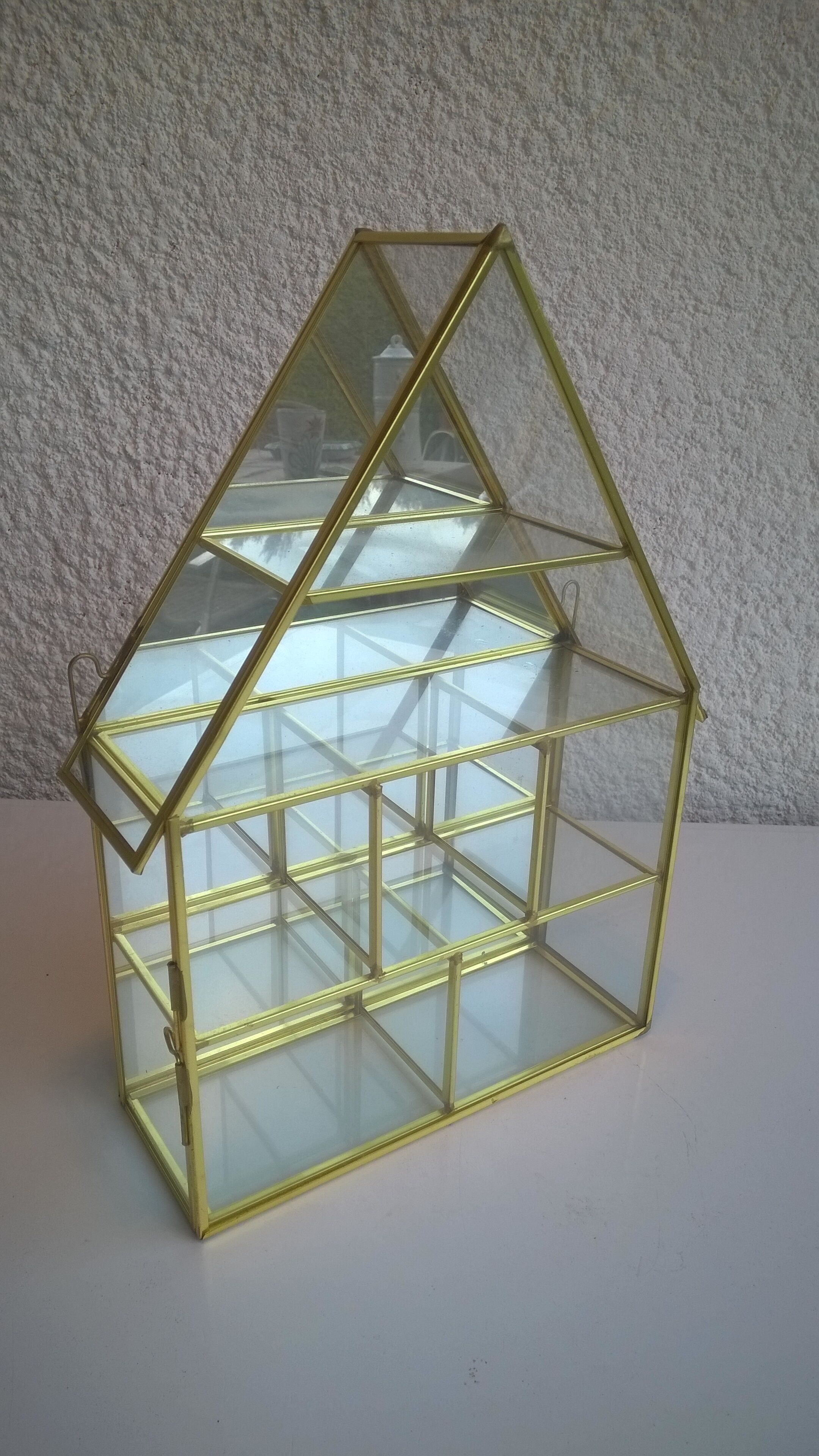 Laiton and glass window