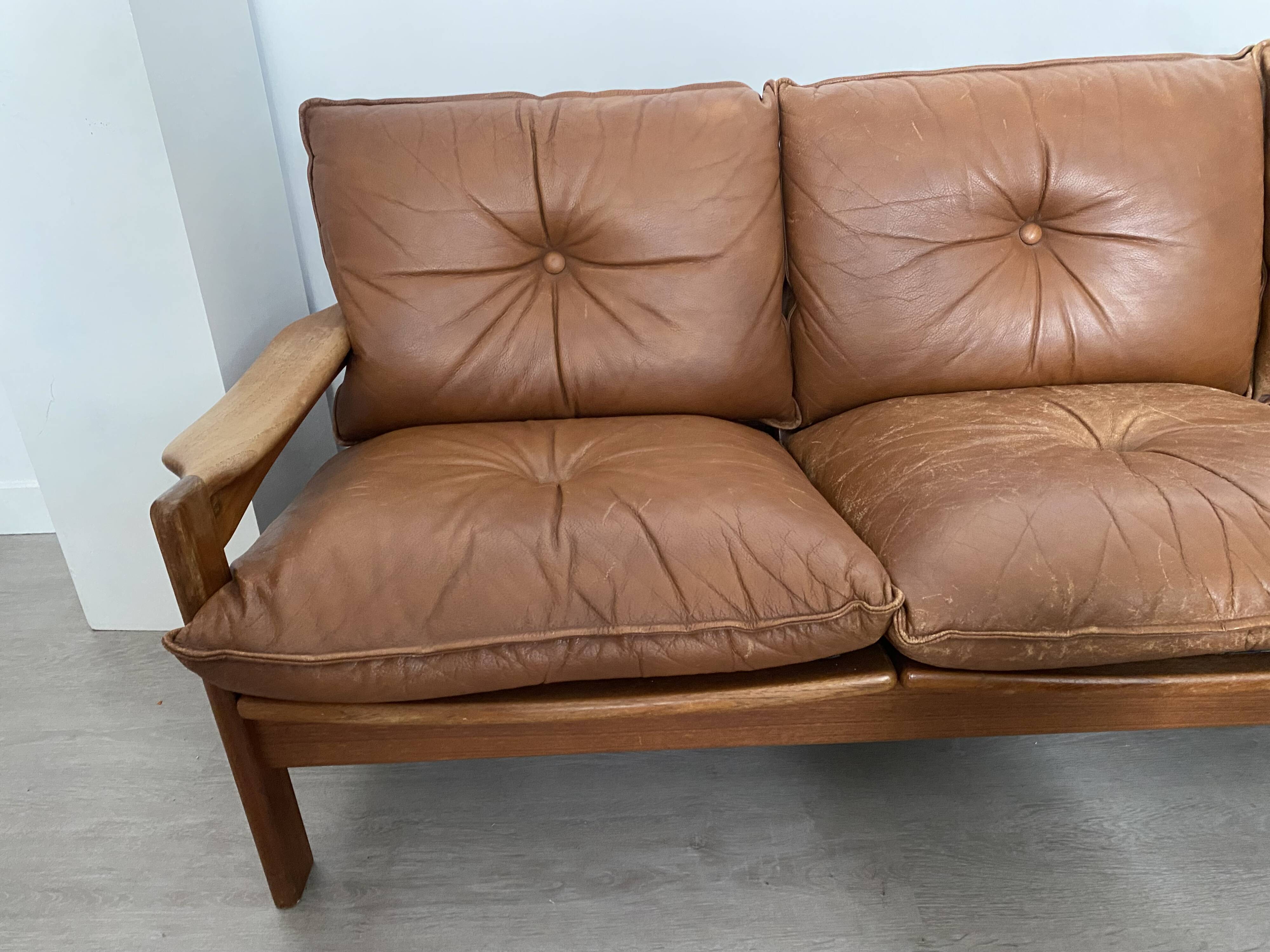 Scandinavian sofa in brown leather and solid wood