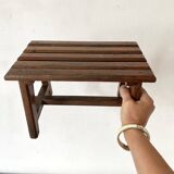 Low stool with wooden slats