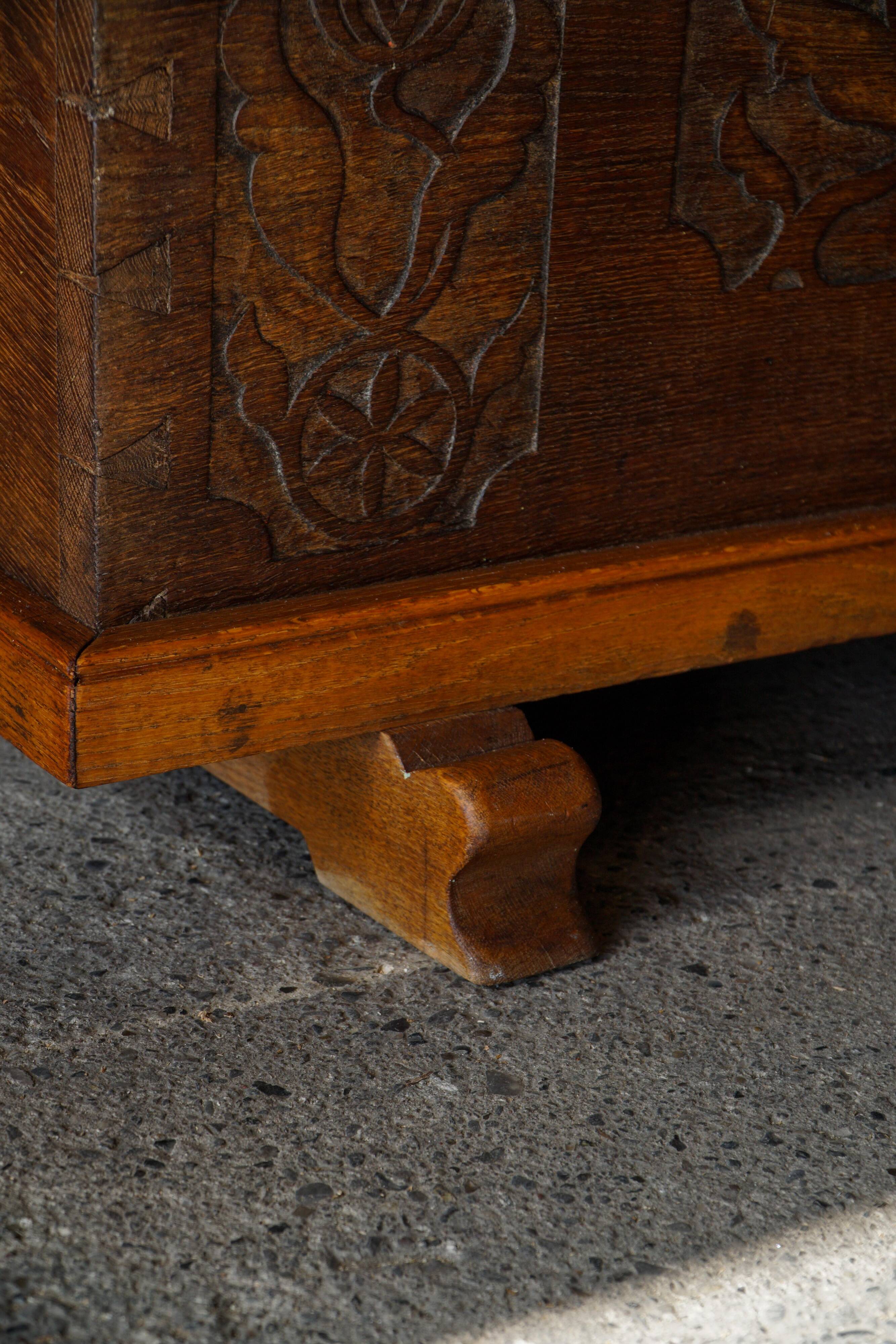 18th-century Scandinavian popular art oak chest with carved panels, dated 1764.
